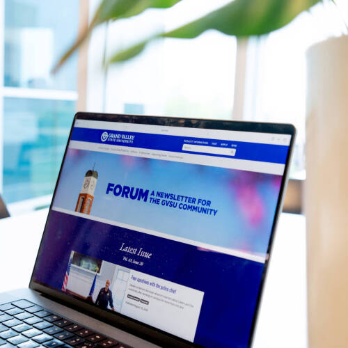screenshot of Forum website on laptop